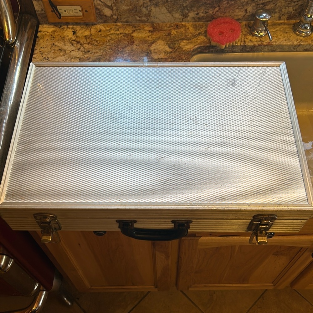 Aluminum padded case, handy for carrying anything; 24”long, 13.5”wide 4” deep